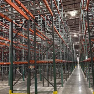 Interack pallet racking system. Features (130) 8' and (10) 12' sections, measuring 3'8"D x 26'H. Equipped with 3.5" cross bars, wire decking, and yell