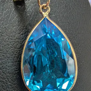 10K(1.49G), BLUE TOPAZ (6.6CT) PENDANT, SUGGESTED RETAIL VALUE $1000