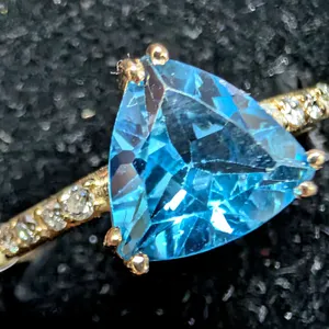 10K(1.8G), BLUE TOPAZ (1CT), DIAMOND (0.06CT) RING, SIZE 7, SUGGESTED RETAIL VALUE $2400