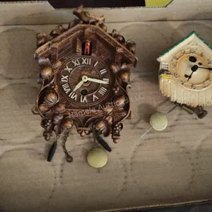 2 small wall clocks