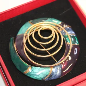 INFINITY 1980’S GP ENAMEL BROOCH