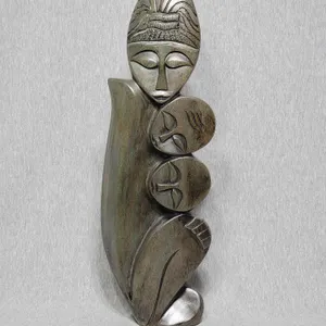 Shona Sculpture Mother and Children. 19 x 6 x 2.5. A4