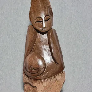 Shona Mother Cradling Child. Signed by Artist Innocent Chifutu. 16.5 x 7 x 3. B3