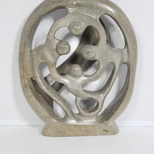 Shona Family of 4 Circle of Love. 9 x 7.5 x 1.5. D6