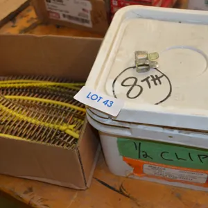 Container of 1/2" H Clips for Sheeting and Partial box of Screws