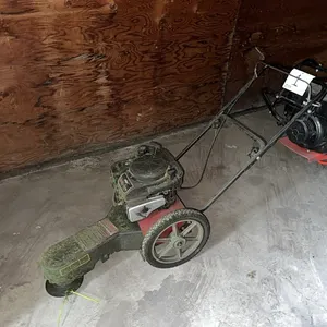 Swisher Trim-N-Mow walk-behind lawn trimmer