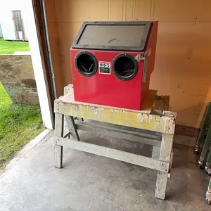 Central Pneumatic bench top abrasive blast cabinet w/ sawhorses