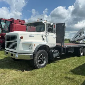 1989 FORD F9000 T/A FLAT DECK PICKER TRUCK
