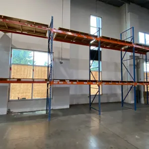 BLUE & ORANGE PALLET RACKING - (7) 18FT X 3 1/2FT UPRIGHTS 3 1/4" X 2" WITH 4 1/2" X 4" X 3/8"