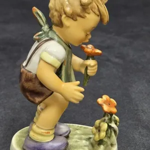 Goebel Hummel figurine titled "The Florist,"