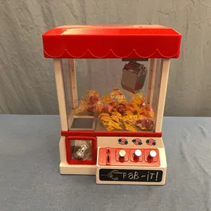 Claw gumball machine