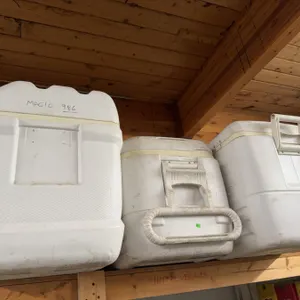 Three White Hard-Sided Coolers