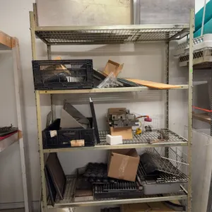 Metal Wire Industrial Storage Shelving With Assorted Contents