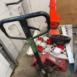 Pallet Jack With Traffic Cones, Barriers, and Weights