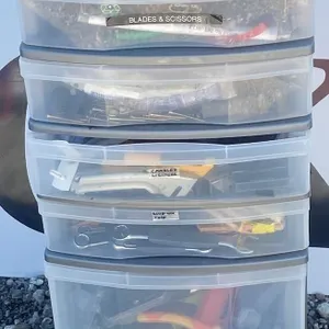 Plastic Storage Drawers with Mixed Tools, Clamps, and Art Supplies