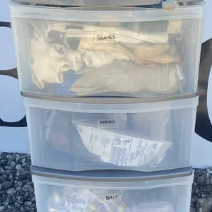 Plastic Storage Drawers With Assorted Gloves Hardware And Supplies