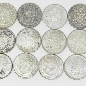 18 CANADIAN CIRCULATED .800 SILVER 50-CENT COINS