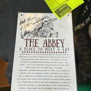 A Signed "The Abbey" Menu. (The Abbey, c. 2019) A laminated multi-page menu from The Abbey Bar & Grill, a landmark establishment in De Pere, Wisconsin