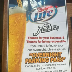 A Miller Lite "The Abbey" Bar Poster. (Miller Brewing Co., circa 2010s) A promotional overnight parking poster for "The Abbey" tavern, featuring the M