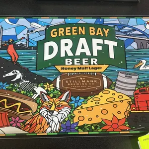 A "Green Bay Draft Beer" Metal Advertising Sign. (Stillmank Brewing Co., Modern) A colorful metal advertising sign for Stillmank Brewing Co.'s Honey M
