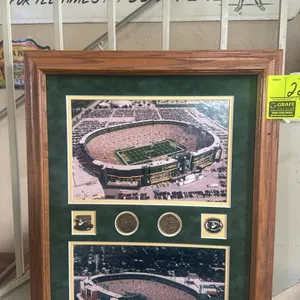 A Lambeau Field Framed Aerial Photographs and Coin Display. (Green Bay Packers, 2003) Framed tribute celebrating the 2003 renovation "Rebirth of a Leg
