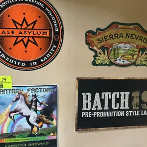 A Collection of Metal Brewery Signs. (Various Makers, Modern) Features four decorative tin signs including Karben4 Brewing 'Fantasy Factory' IPA, Ale 