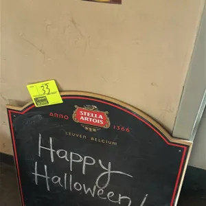A Stella Artois Wall-Mounted Chalkboard. (Stella Artois, Modern) An advertising chalkboard featuring the Stella Artois logo with 'Anno 1366' and 'Leuv