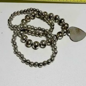 3 Silvertone Bead Stretch Bracelets