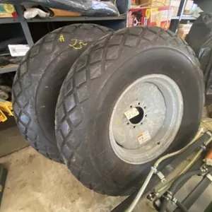Pair 14.9-24 Turf Tires & Wheels - Like New