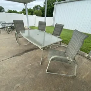 Glass Topped Patio Table w/4 Adjustable Chairs