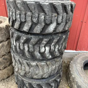 (4) 10x16.5 Skidloader Tires, Rimguard