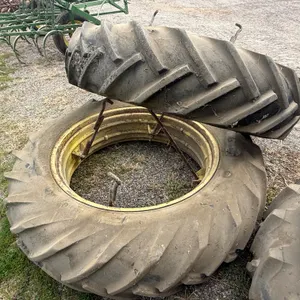 (2) 14.9x38 BF Goodrich Tires on Dual Rims with Hardware, Buying Both for One Money