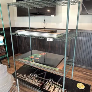 48"x24"x75" steel shelf w/ assorted UND pictures
