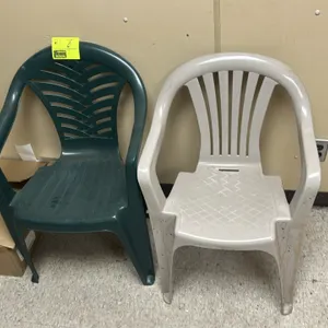 Pair of plastic molded lawn chairs. Includes one dark green armchair with a woven-style slat back and one light gray armchair with a vertical slat bac