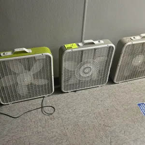 Aerospeed poly box fan. Features a lightweight plastic housing, integrated top carrying handle, and manual speed control dial. Equipped with a two-pro