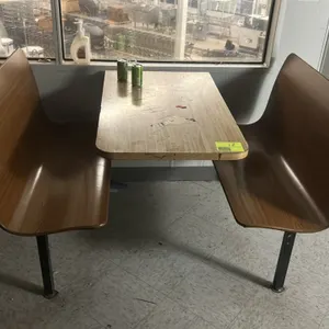 4-passenger restaurant booth. Features a woodgrain laminate tabletop and two matching laminate bench seats on black metal support frames. Dimensions: 