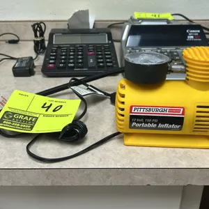 Pittsburgh Automotive 62747 12V portable inflator. Features 150 PSI maximum pressure, built-in analog pressure gauge, and integrated air hose with qui