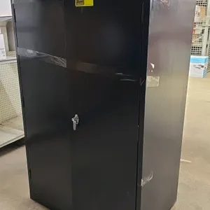Sandusky 2-door metal cabinet. Features durable steel construction with a black finish, double doors, and a locking handle. 36"W x 24"D x 60"H. Note: 