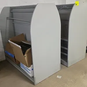 Portable laminated merchandiser. Features gray laminate construction with curved side panels, double-sided display area, crossbars, and wire shelves. 