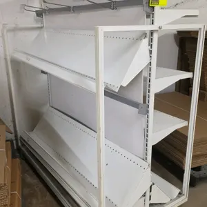 51"L portable metal merchandiser rack. Features double-sided construction with adjustable flat and slanted metal shelves. Includes assortment of peg h