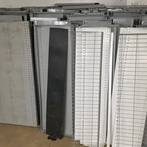 Quantity of assorted size retail display shelves. Features sturdy metal construction in gray and white finishes. Includes wire shelf fencing as shown.