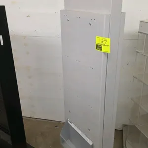 Lamy revolving merchandiser display rack. Features gray metal construction with pre-drilled holes, 'LAMY Design. Made in Germany.' branding, and two l