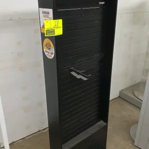 Double-sided metal slatwall merchandiser display rack. Features black metal construction with slatwall tracks on both sides. Includes one metal peg ho
