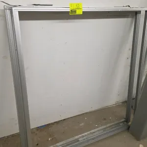 Aluminum frame. Features extruded aluminum construction. 47.5" x 48.75".
