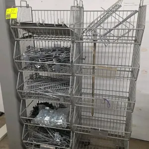 Stackable wire merchandiser basket. Features open-front design for retail display. Basket size: 18" x 15.5" x 10". Includes assorted peg hooks as show