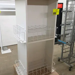 Portable laminated 4-sided merchandiser display rack. Features a light wood laminate top and base with a white center tower. Equipped with white wire 