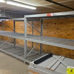 8'L of Madix pallet racking. Features 3.5" crossbars and wire decking. Dimensions: 48" x 85". Contents not included.