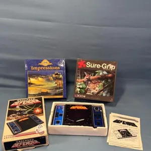 (2) PUZZLES AND ARCADE DEFENDER GAME