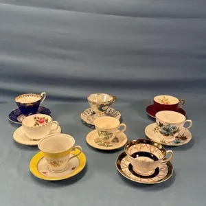 8 CUPS AND SAUCERS