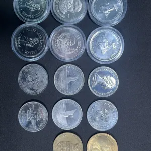 12 Nickel or Nickel-Plated Steel Canadian Trade Tokens